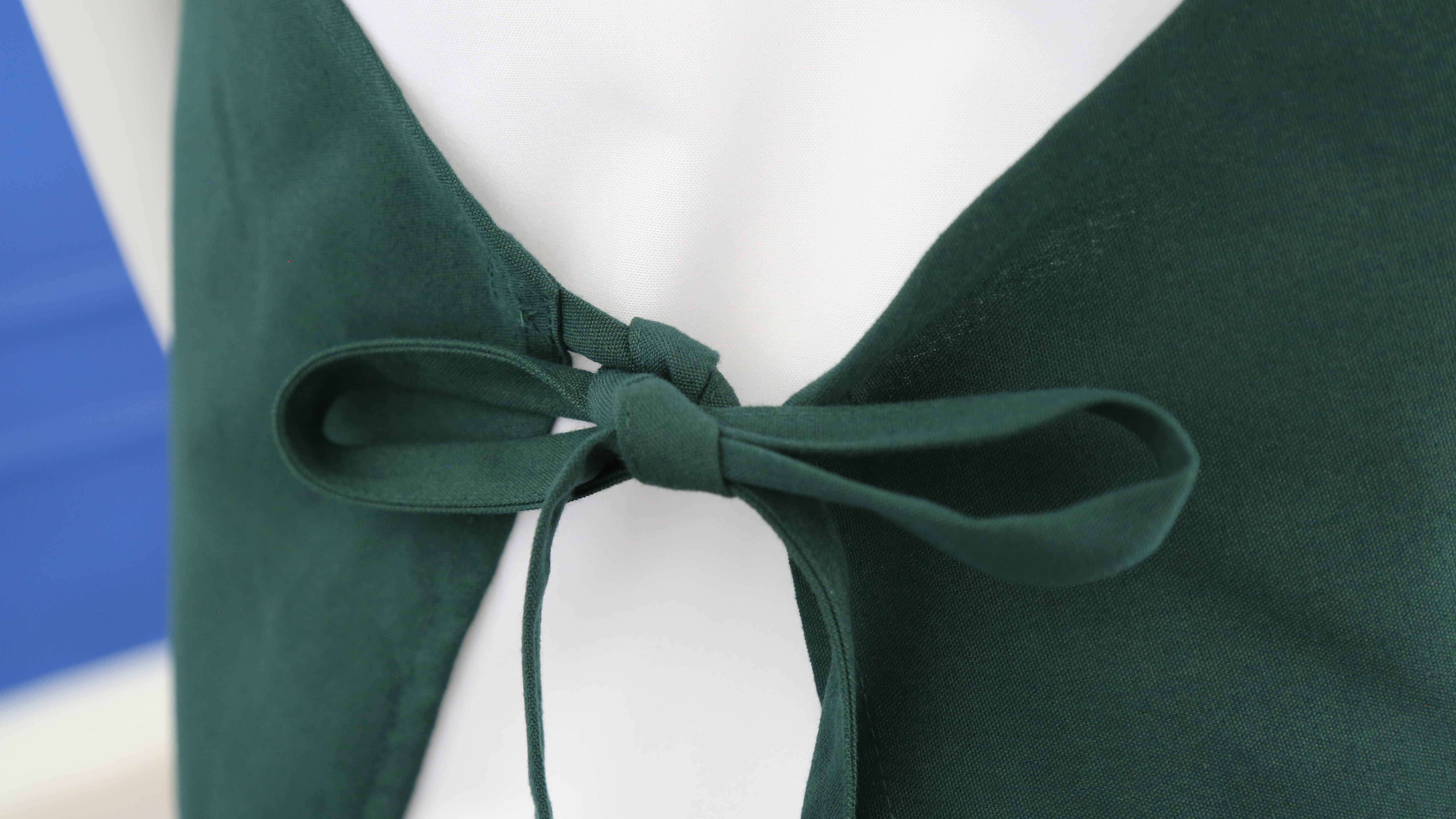Tạp dề polyester màu xanh lá cây có túi không có túi