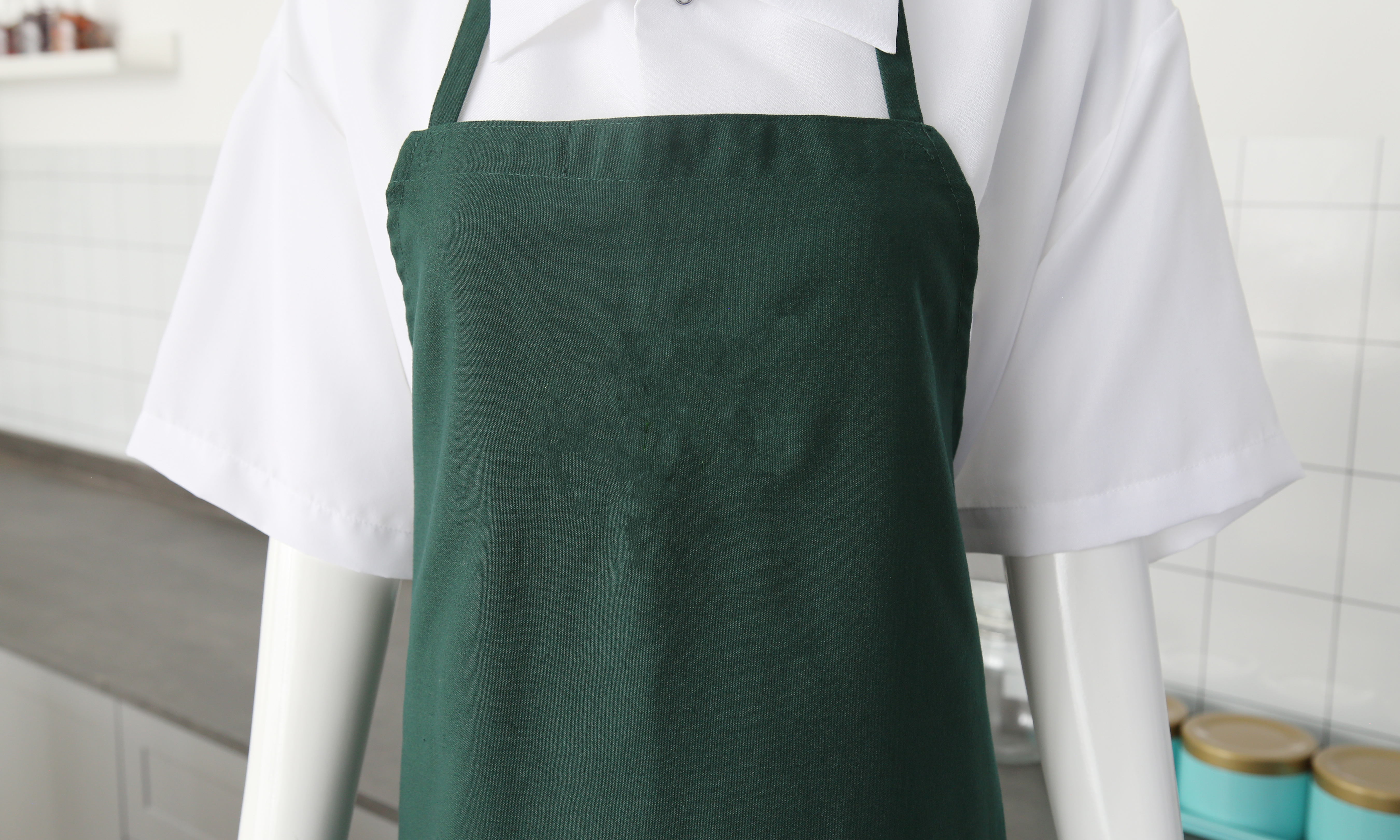Tạp dề polyester màu xanh lá cây có túi không có túi