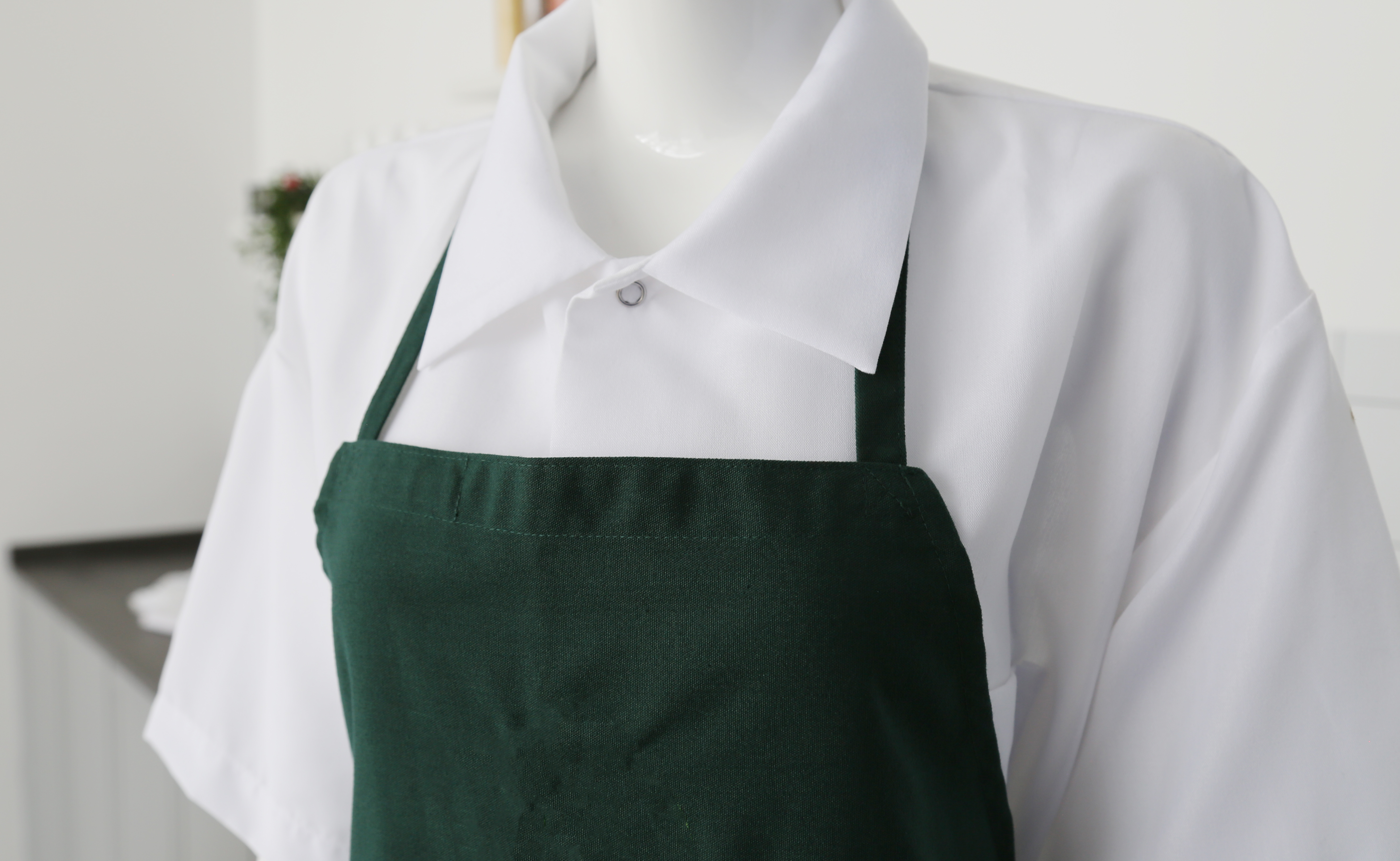 Tạp dề polyester màu xanh lá cây có túi không có túi